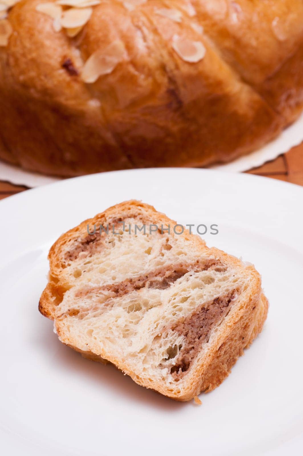 Piece of nut cake on a plate
