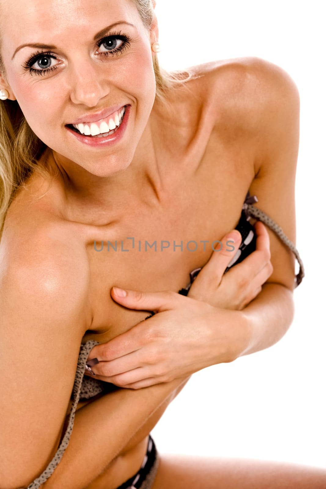 Beautiful young woman in underwear isolated on white background