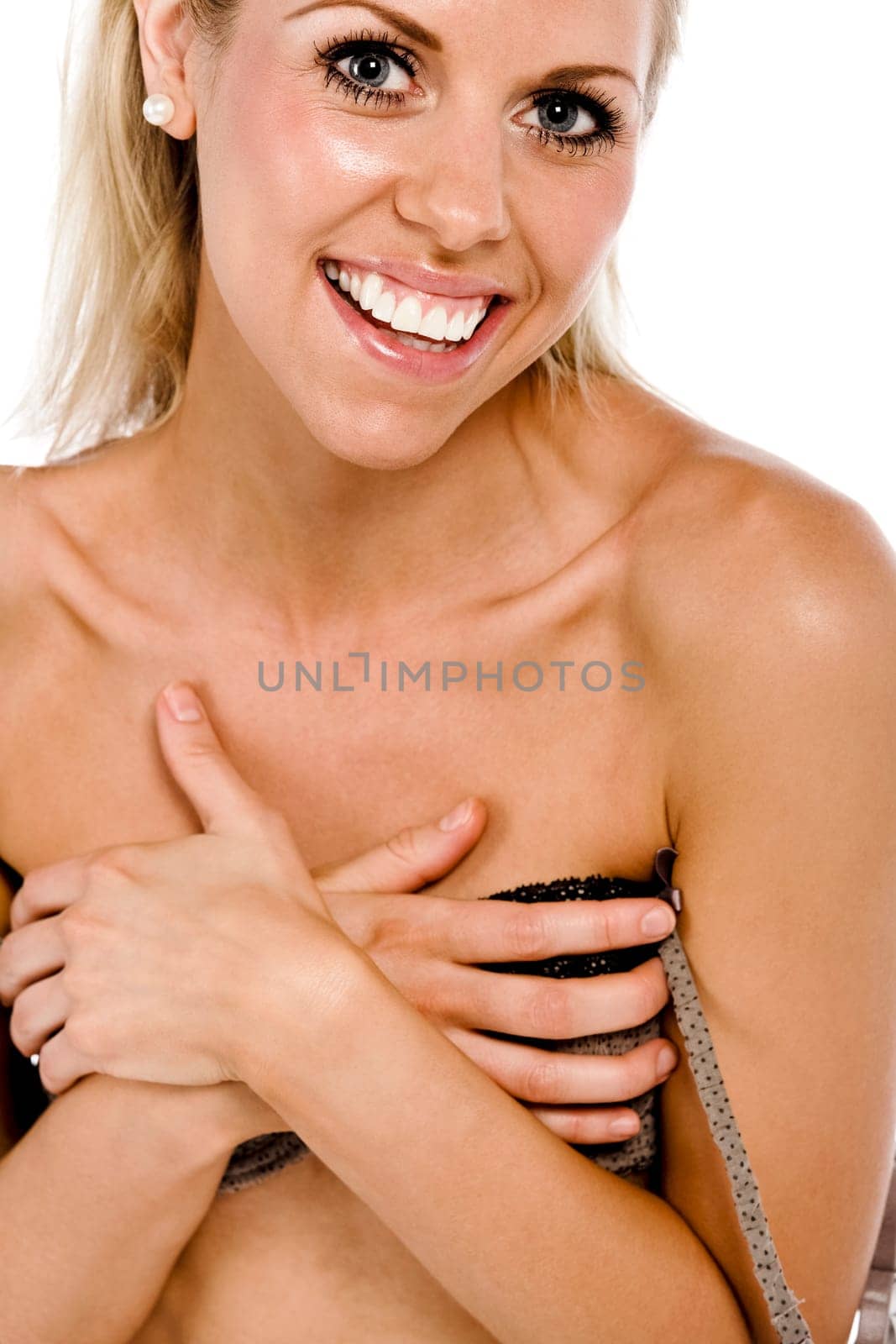Beautiful young woman in underwear isolated on white background