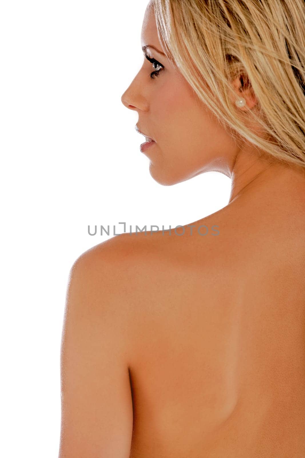 Attrative woman's back with face in profile with blonde hair isolated on a white background