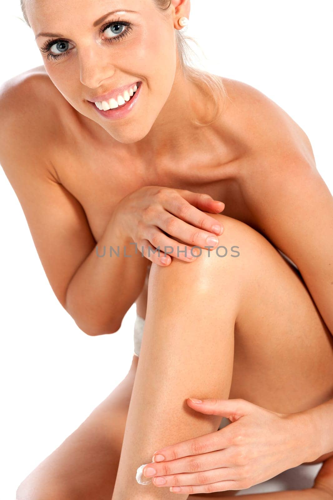 Beautiful young woman in beauty style pose naked on white background