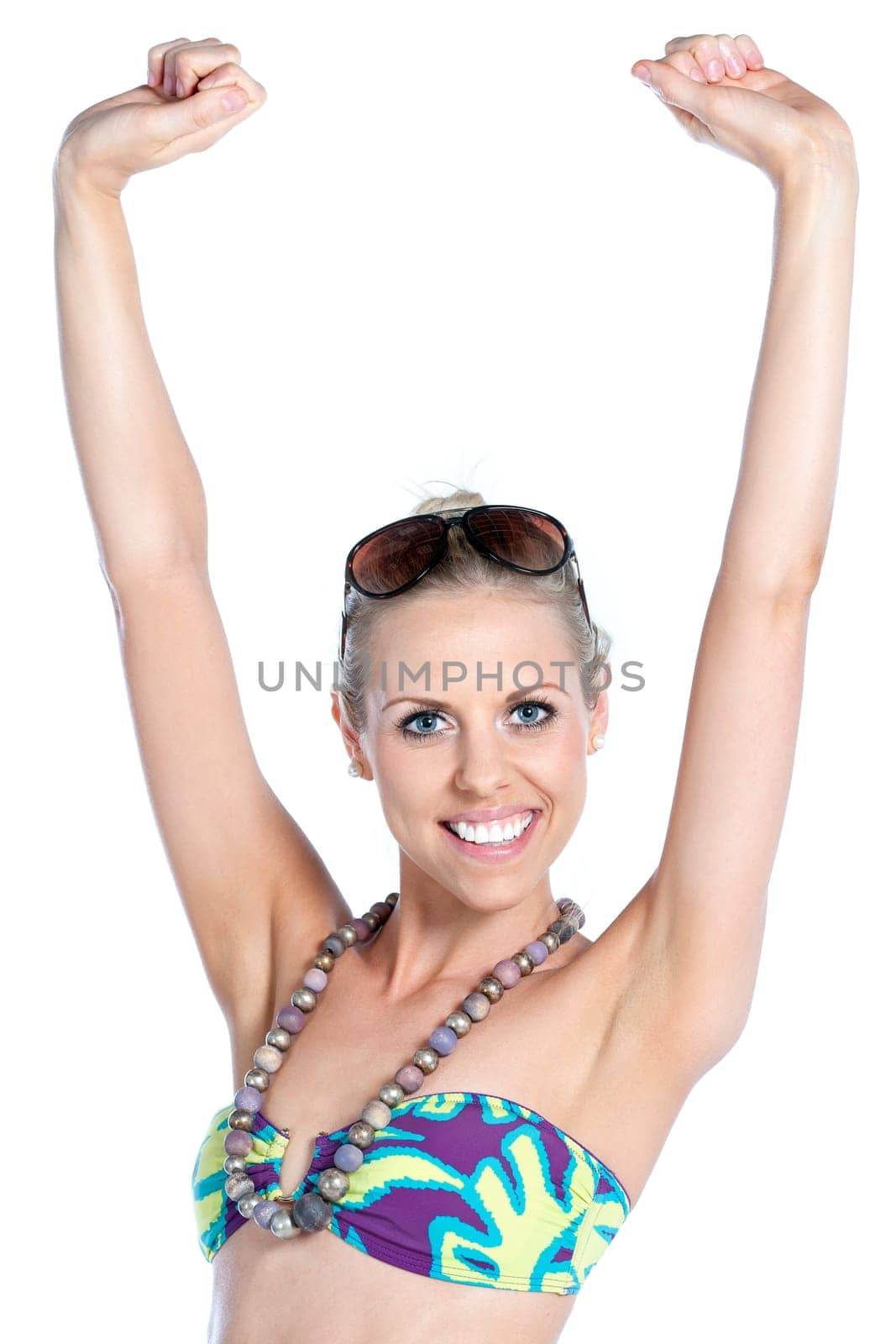 Sexy young woman wearing a bright bikini