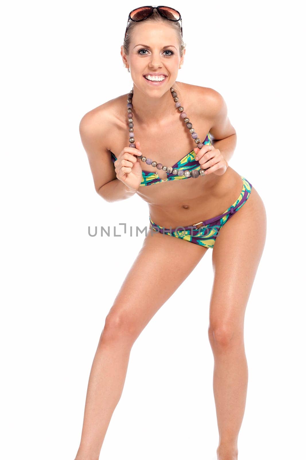 Sexy young woman wearing a bright bikini