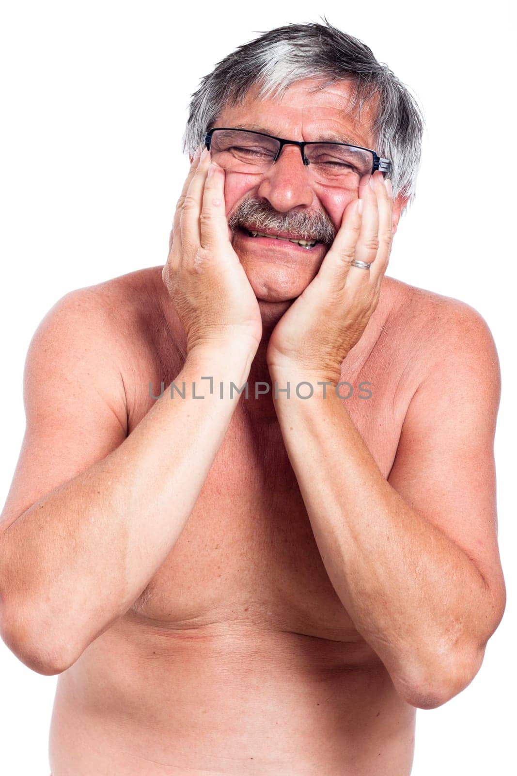 Unhappy senior man with painful toothache, isolated on white background.