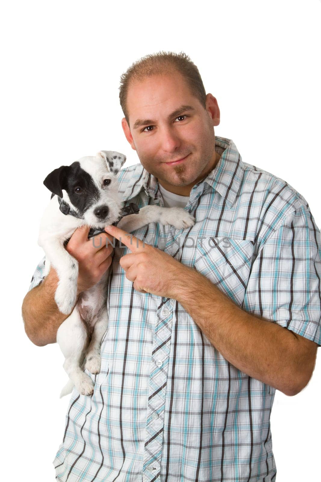 Young man with Pasron Jack Russel isolated on white background