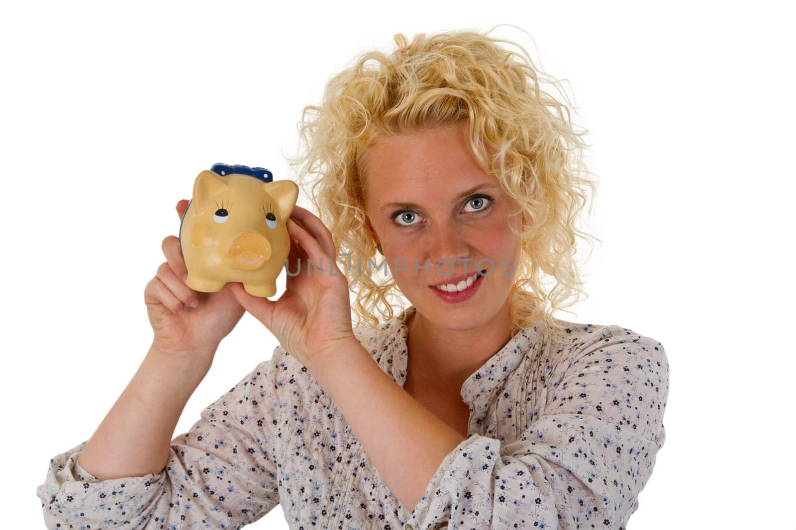 Young woman with piggy bank isolated on white background