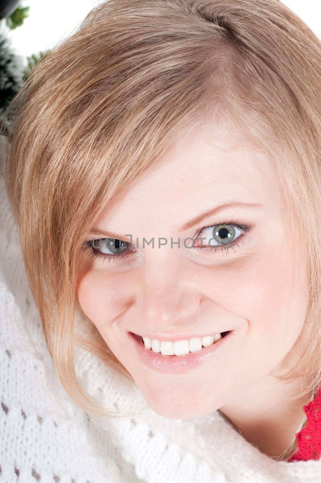 Portrait of beautiful smiling woman isolated on white