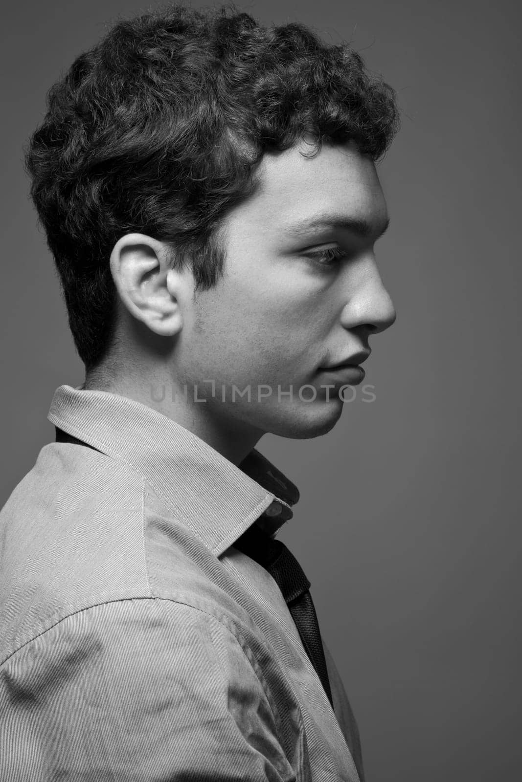 Black and white portrait of an young man