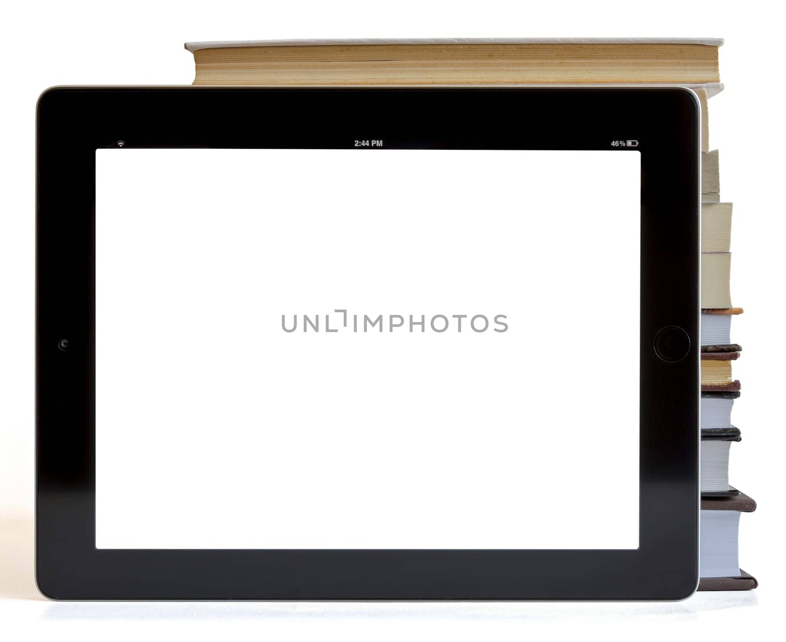 Books and tablet computer isolated on white, digital library concept,