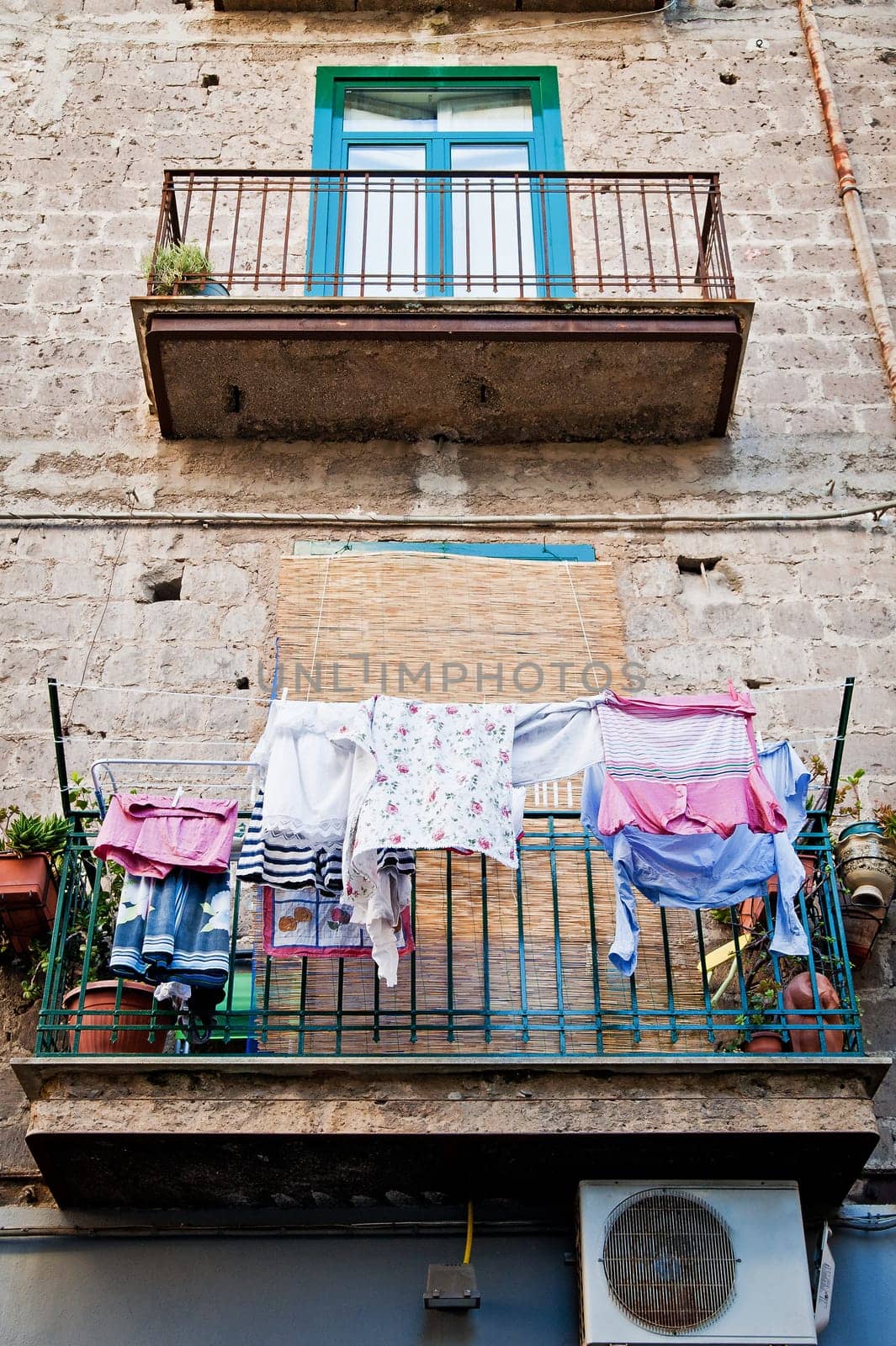 Italian House with laundry hanging in the balcony