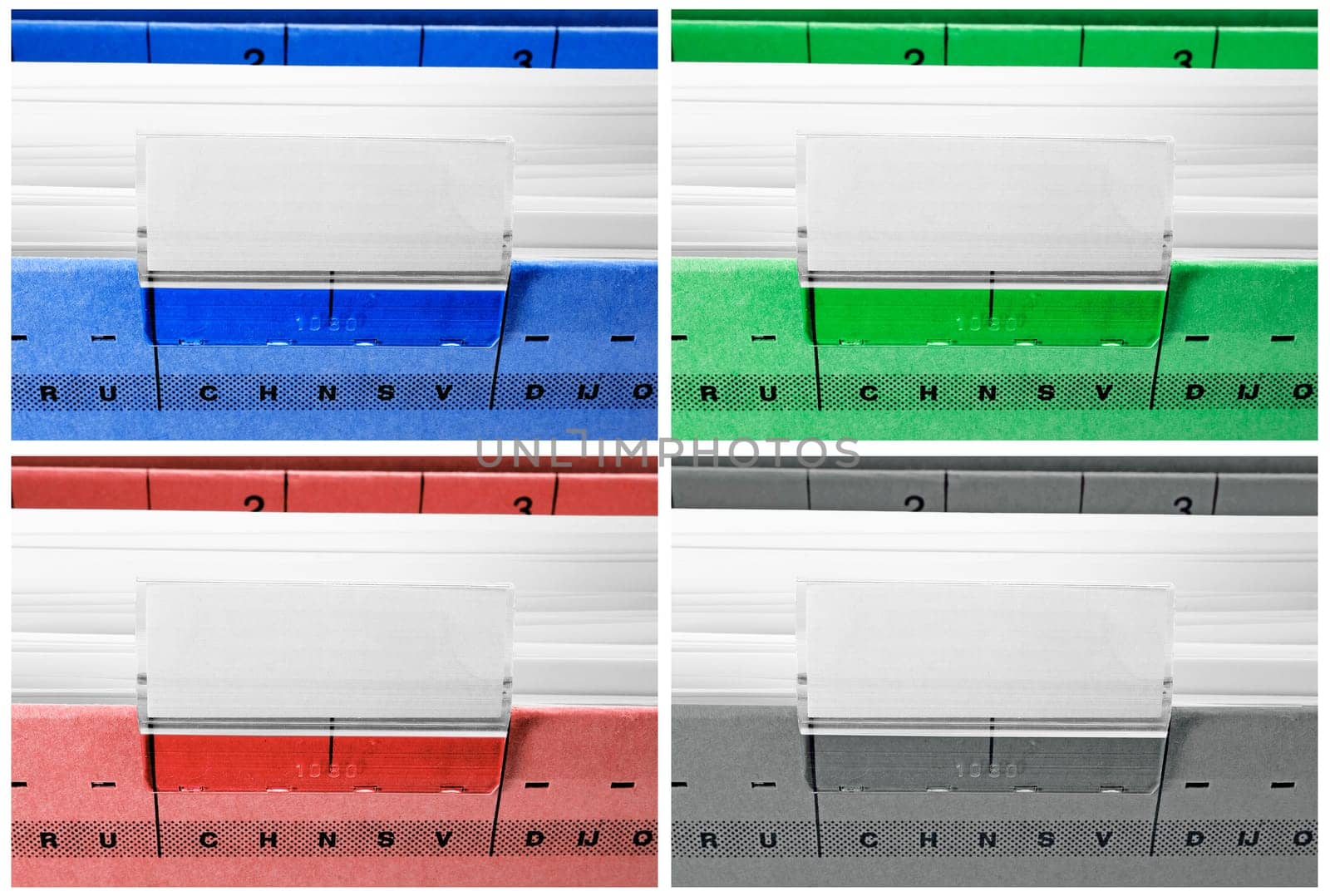 hanging file folders in blue, green, red and grey with blank labels