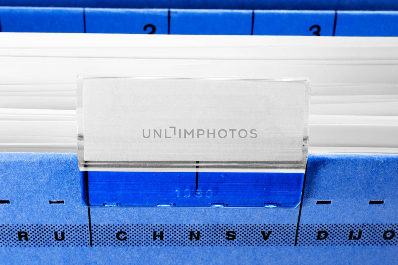 blue hanging file folder with blank label