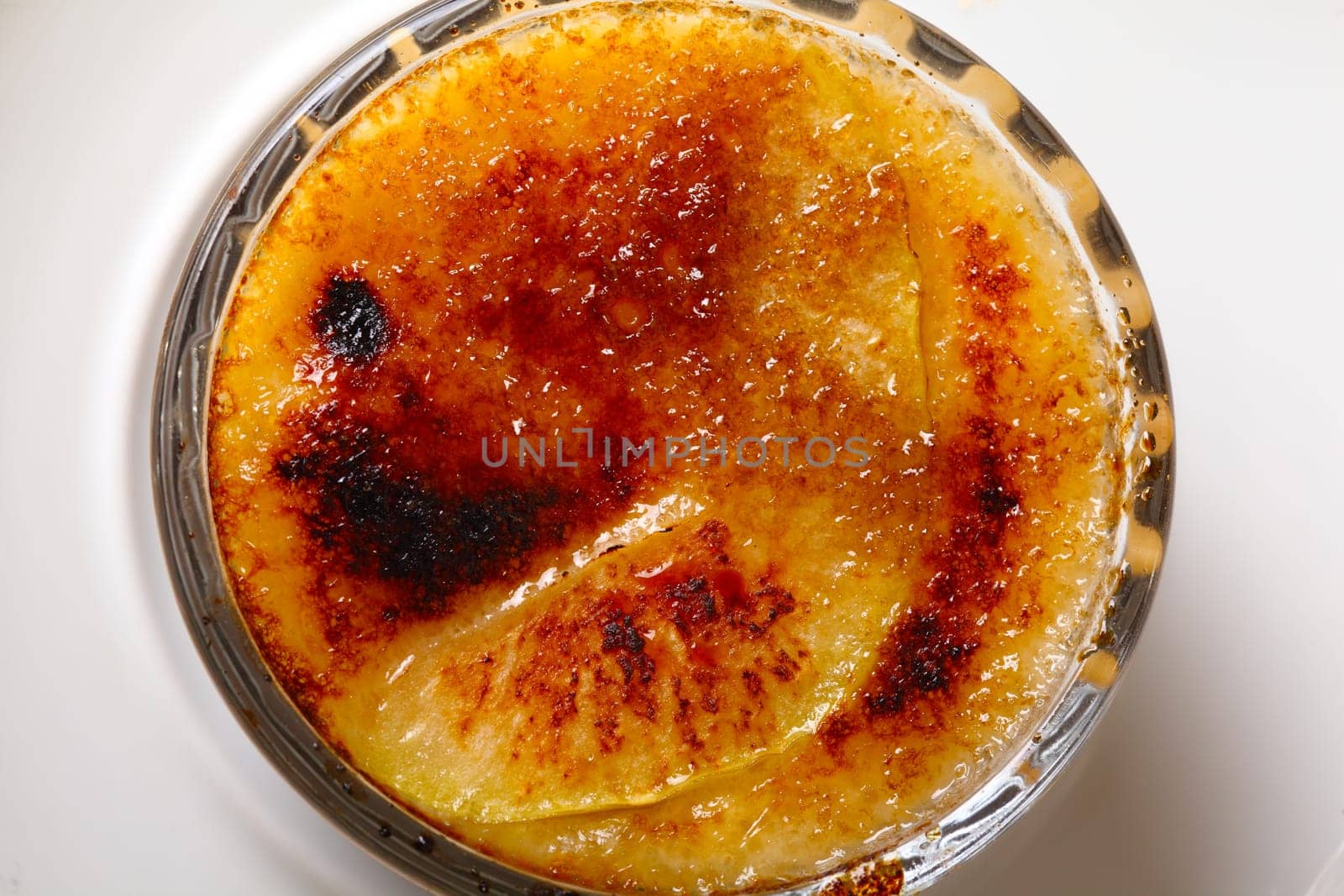 Delicious creme brule in cup of glass