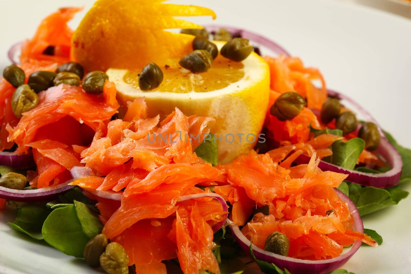 Delicious salmon salad and cappers