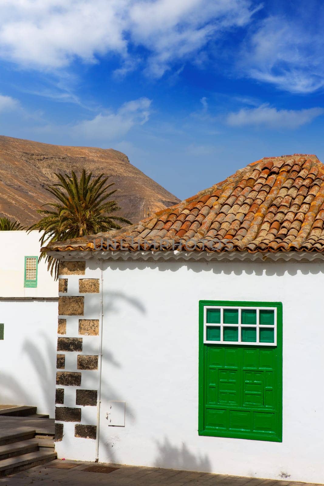 Lanzarote Yaiza white village houses green window in Canary Islands