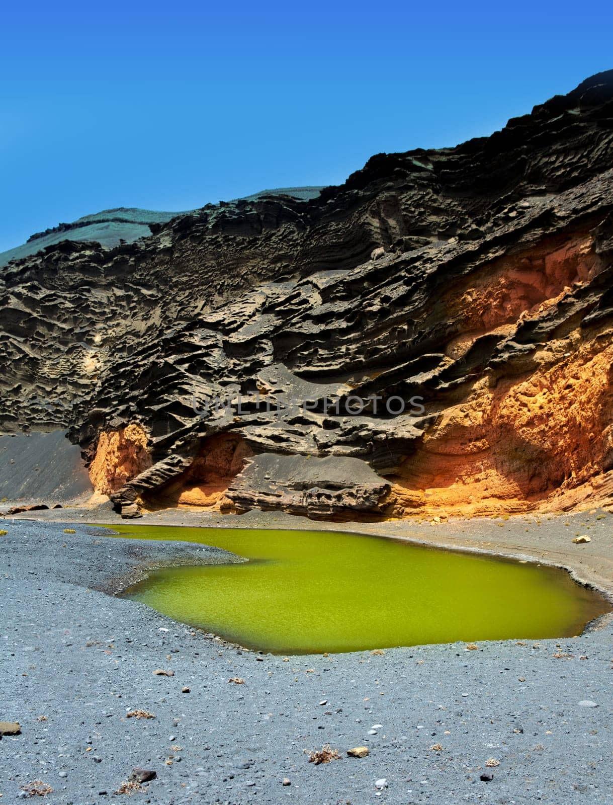 Lanzarote El Golfo Lago de los Clicos green water in volcanic Canary Islands