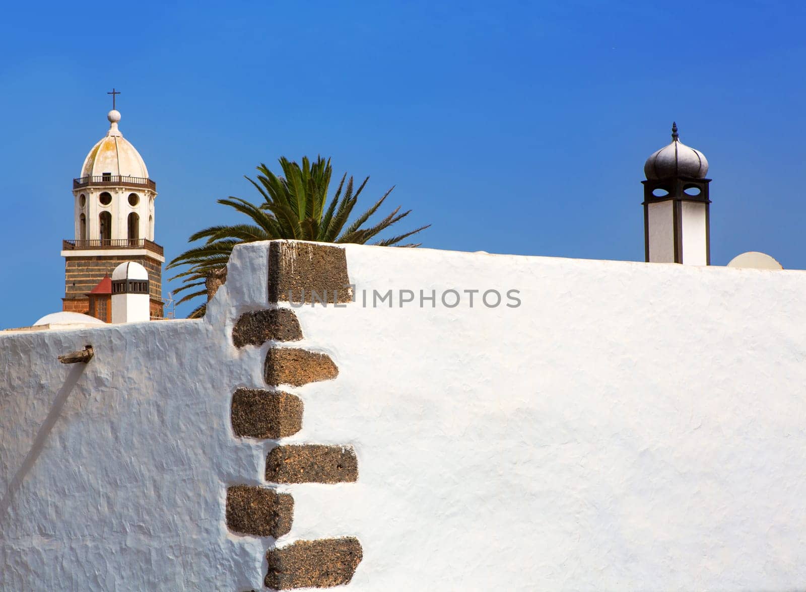 Lanzarote Teguise white village with church tower in Canary Islands
