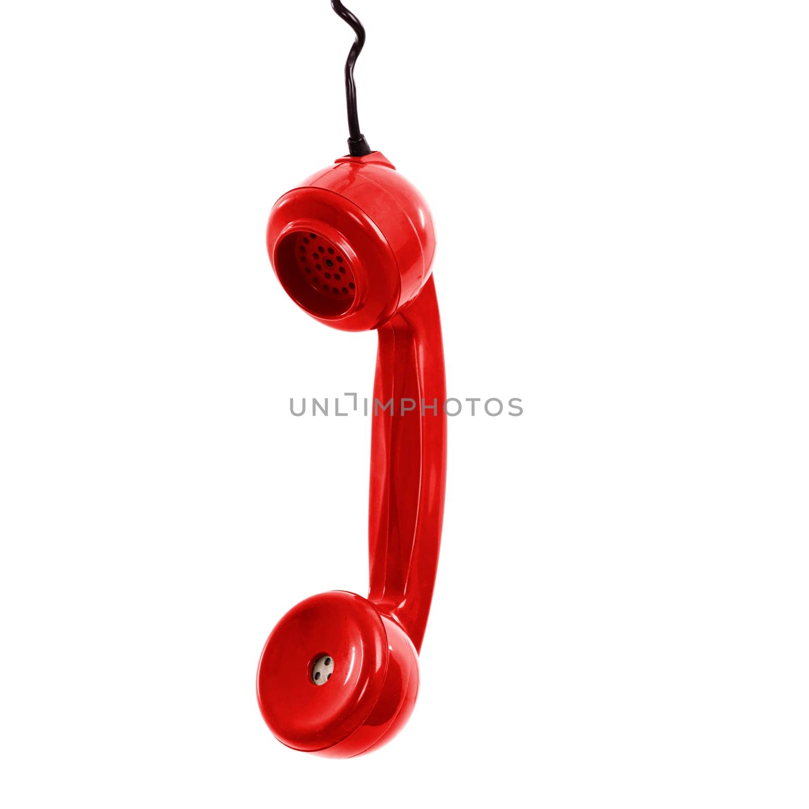 Red handpiece from a vintage telephone, isolated on white