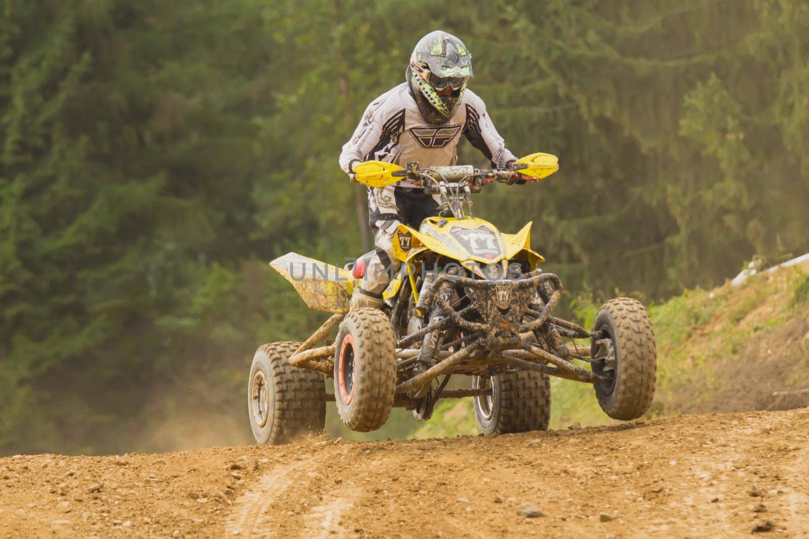 MOHELNICE,  CZECH REPUBLIC - SEPTEMBER 08: Racer rides a yellow quad motorbike in the "International Championship of the Czech Republic 2012"" on September 08, 2012 in MOHELNICE, Czech Republic."