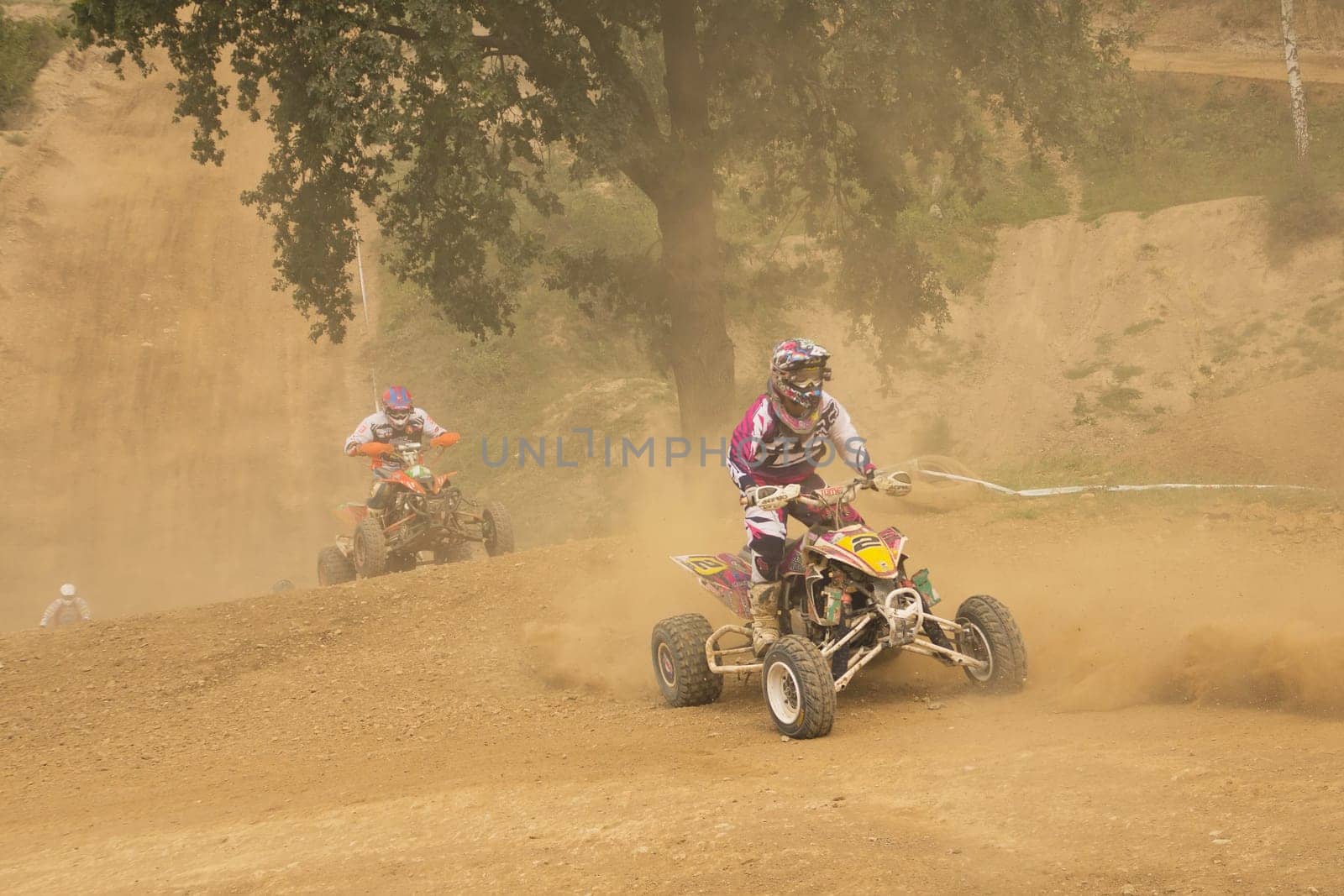 MOHELNICE,  CZECH REPUBLIC - SEPTEMBER 08: Two riders in a quad motorbike race. "International Championship of the Czech Republic 2012"" on September 08, 2012 in MOHELNICE, Czech Republic."