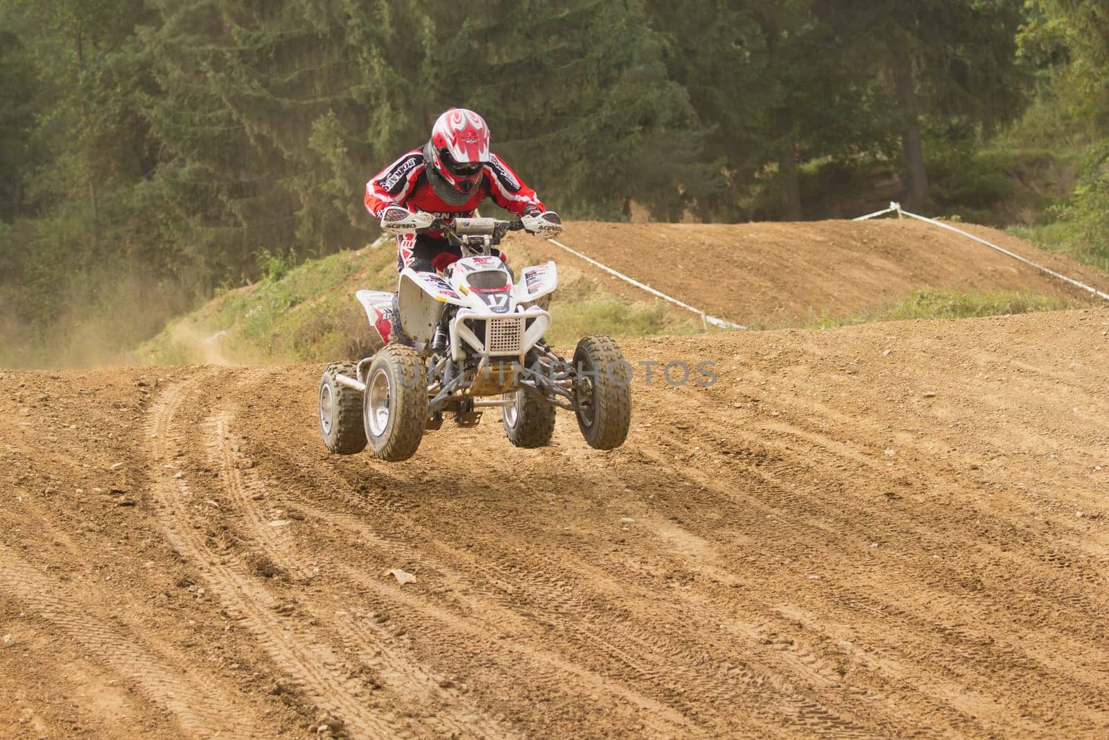 MOHELNICE,  CZECH REPUBLIC - SEPTEMBER 08: Unidentified racer rides a quad motorbike in the "International Championship of the Czech Republic 2012"" on September 08, 2012 in MOHELNICE, Czech Republic."