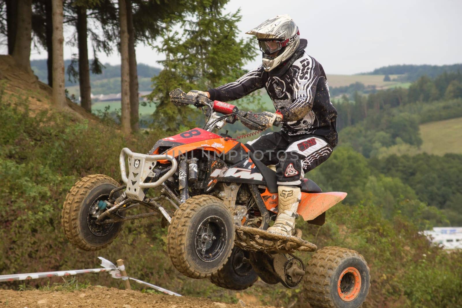 MOHELNICE,  CZECH REPUBLIC - SEPTEMBER 08: Unidentified racer jumps a quad motorbike in the "International Championship of the Czech Republic 2012"" on September 08, 2012 in MOHELNICE, Czech Republic."