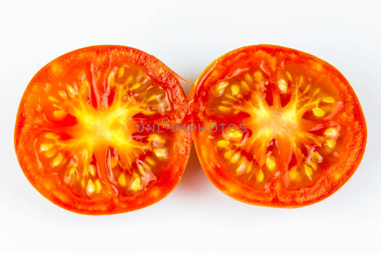 Half a tomato isolated on a white background