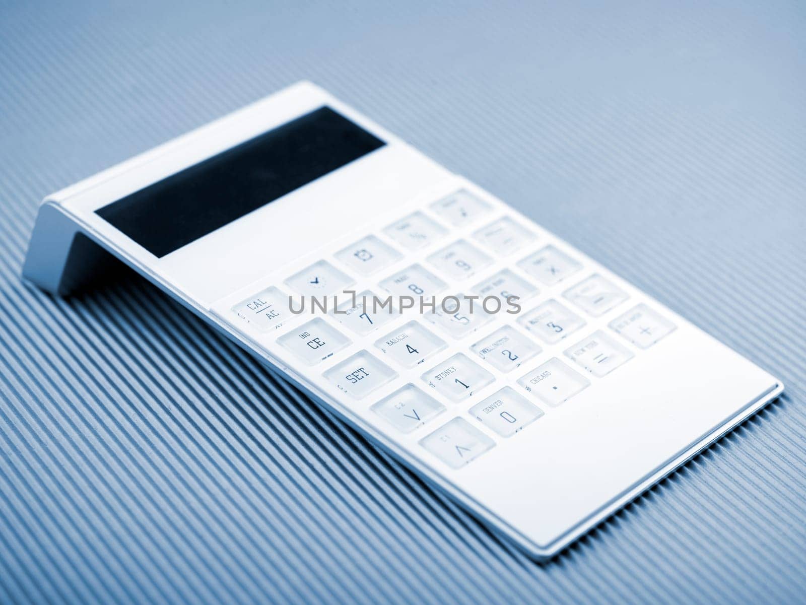 White Calculator On Office Desk