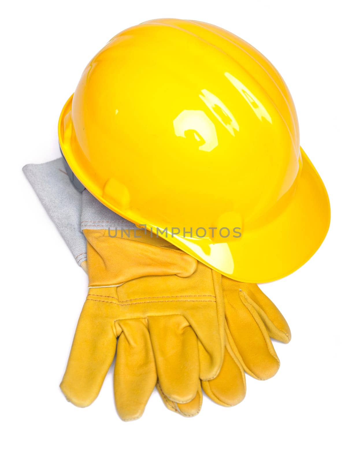 Hard Hat And Leather Gloves on white