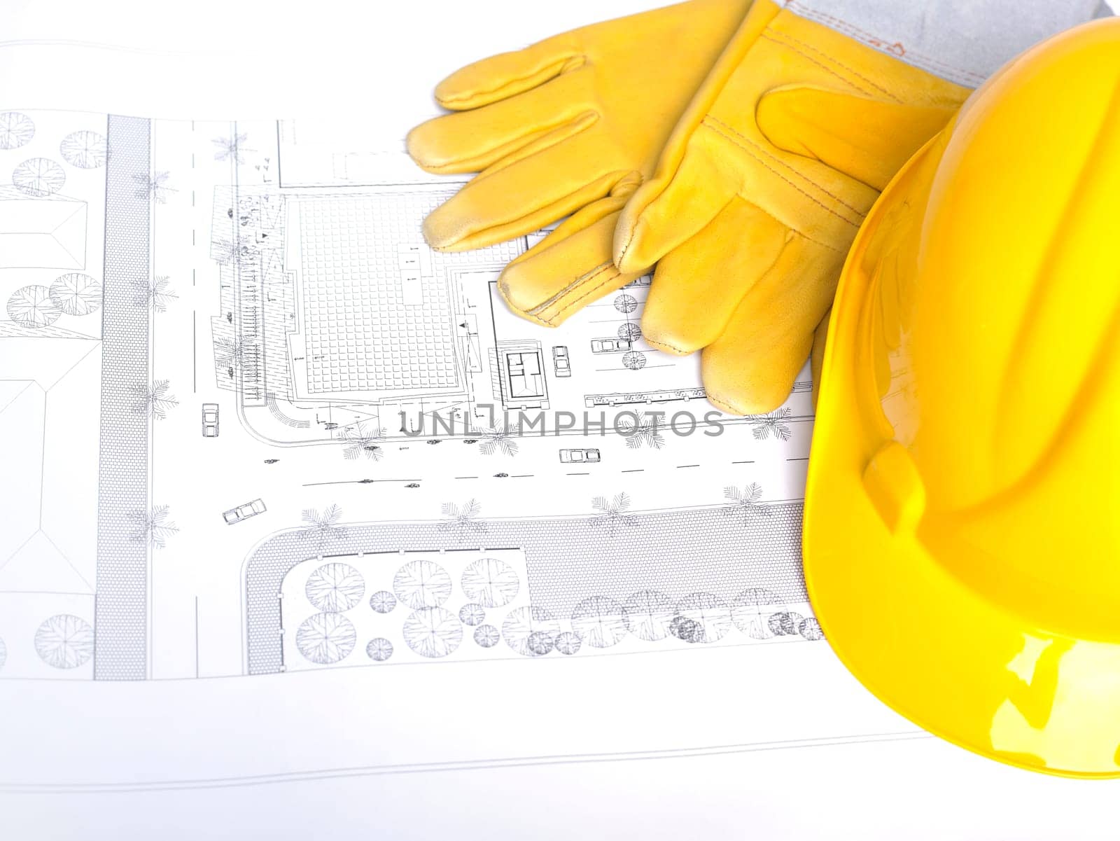 Hard Hat And Leather Gloves on white