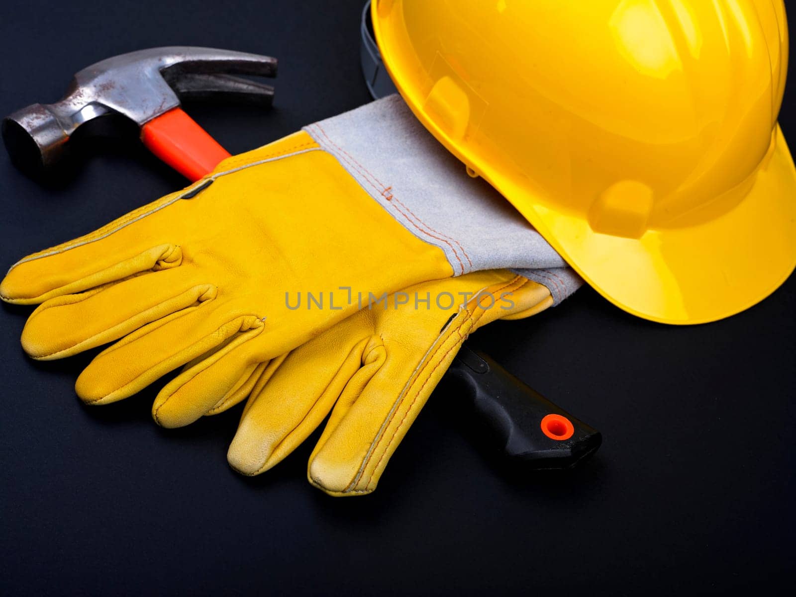 HardHat Hammer And Gloves on black