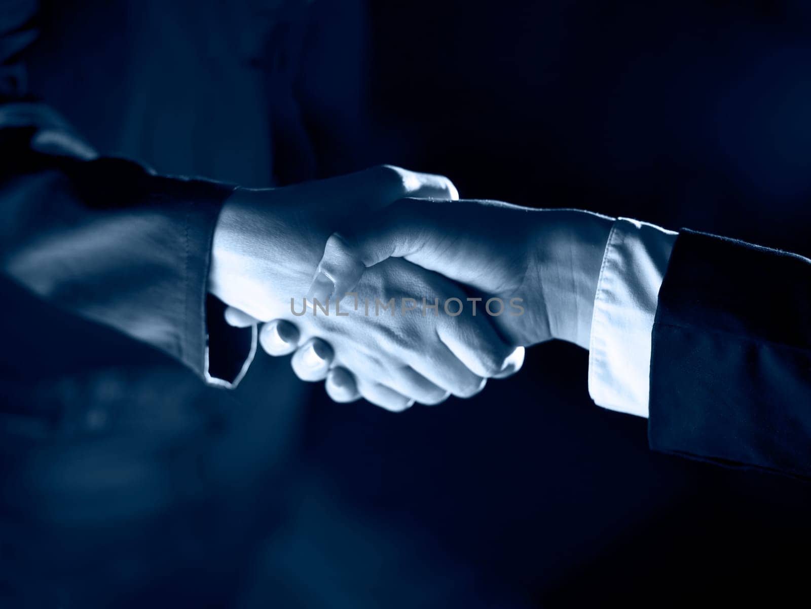 Handshake Handshaking dark and light