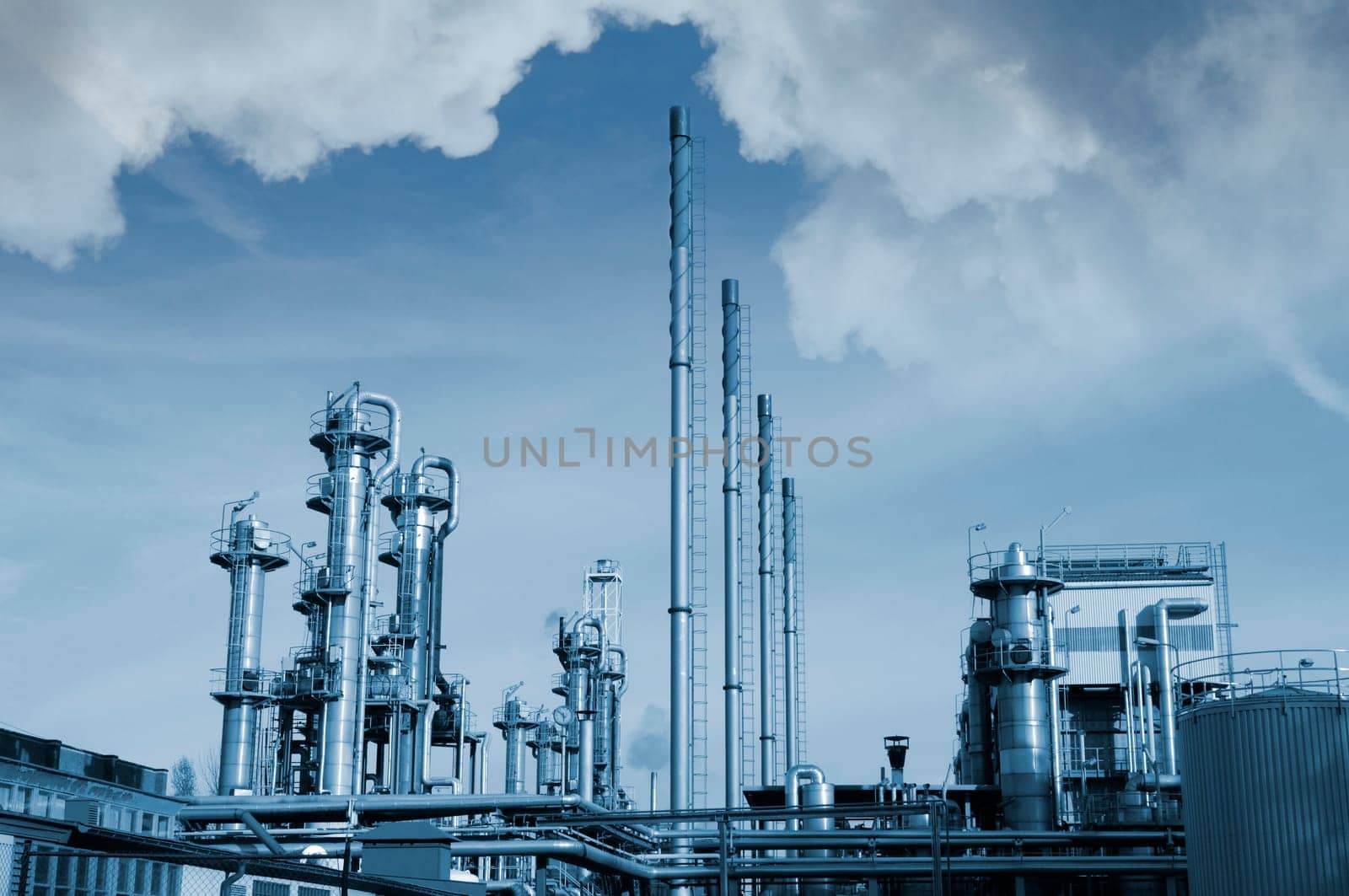 oil and gas industry, refinery and in a blue toning concept