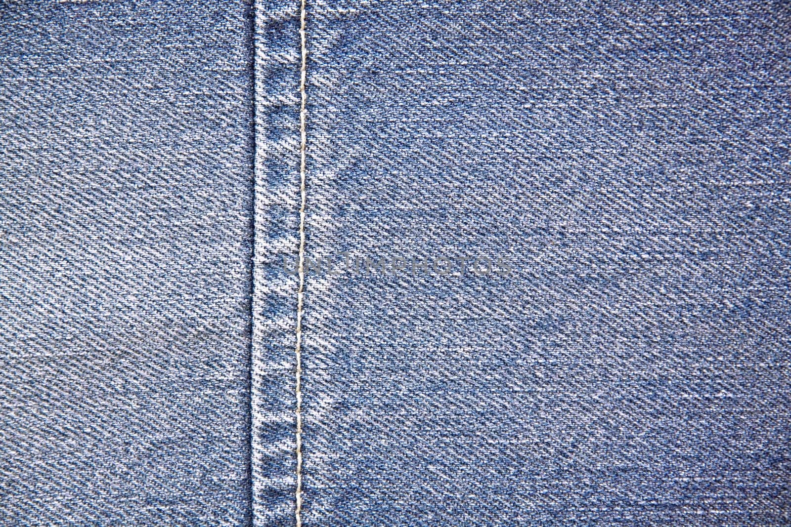 seam of a blue jeans