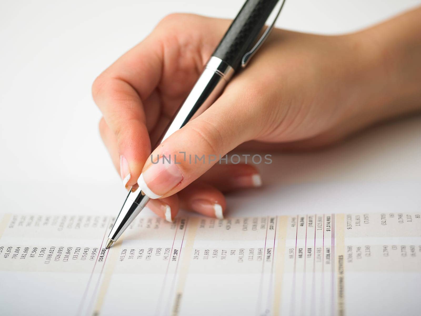 Market Analyze - pen and calculator on papers