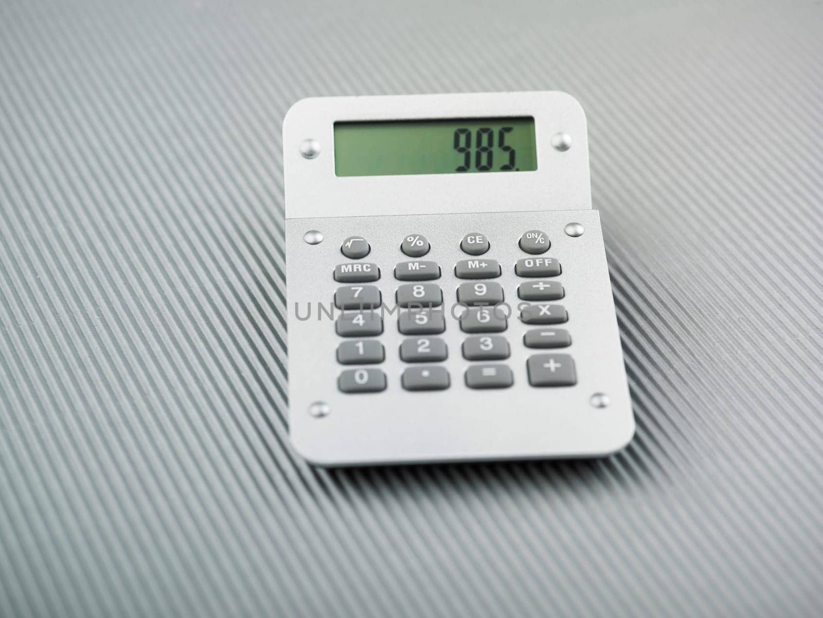 Silver Calculator on office table
