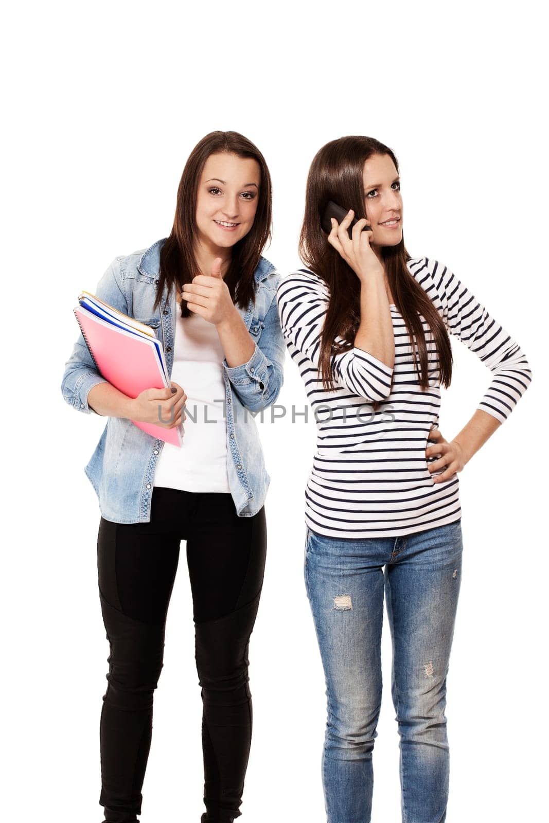 Students talking on the phone and showing thumbs up against white background