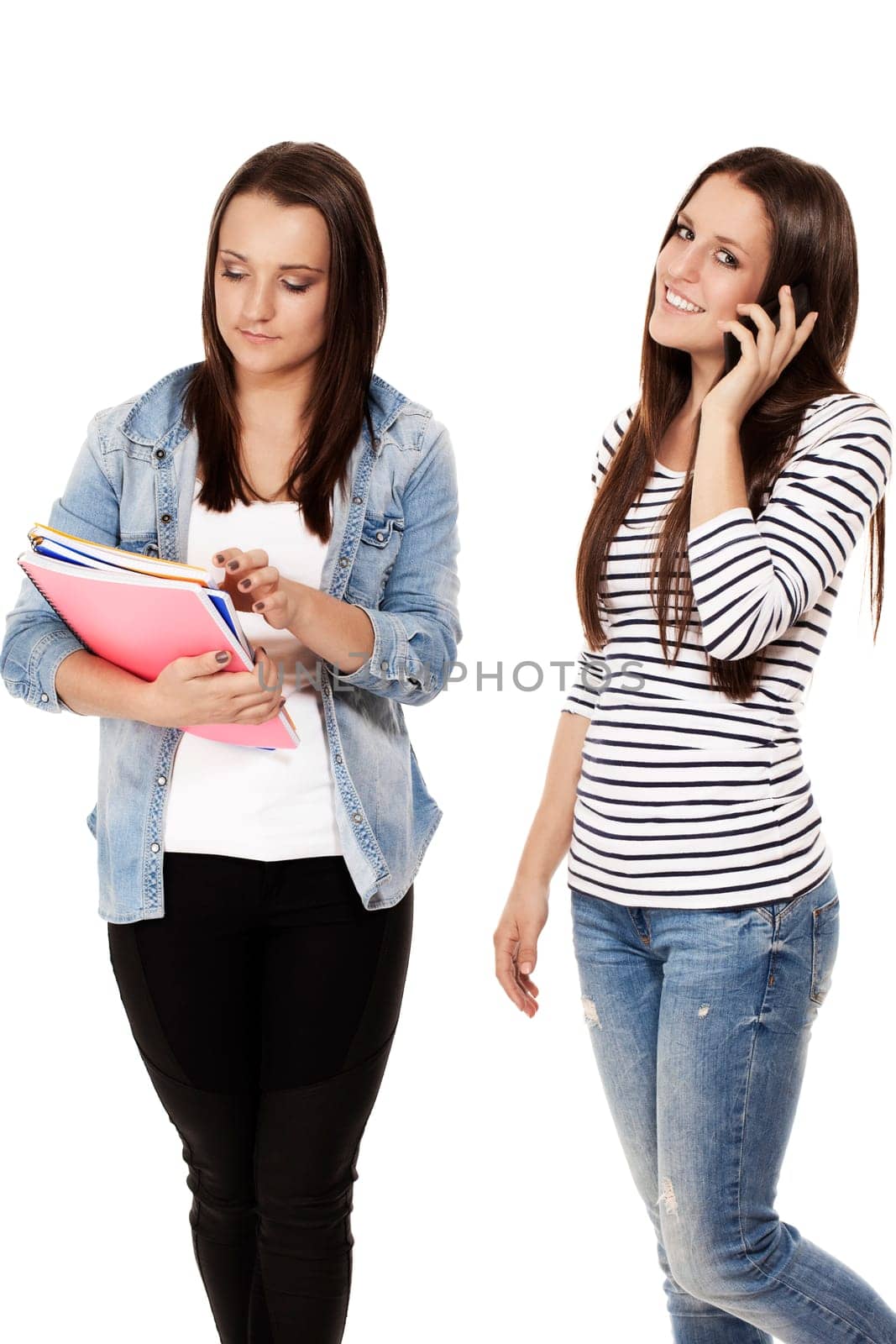 Pupils talking on the phone and holding notebooks against white background