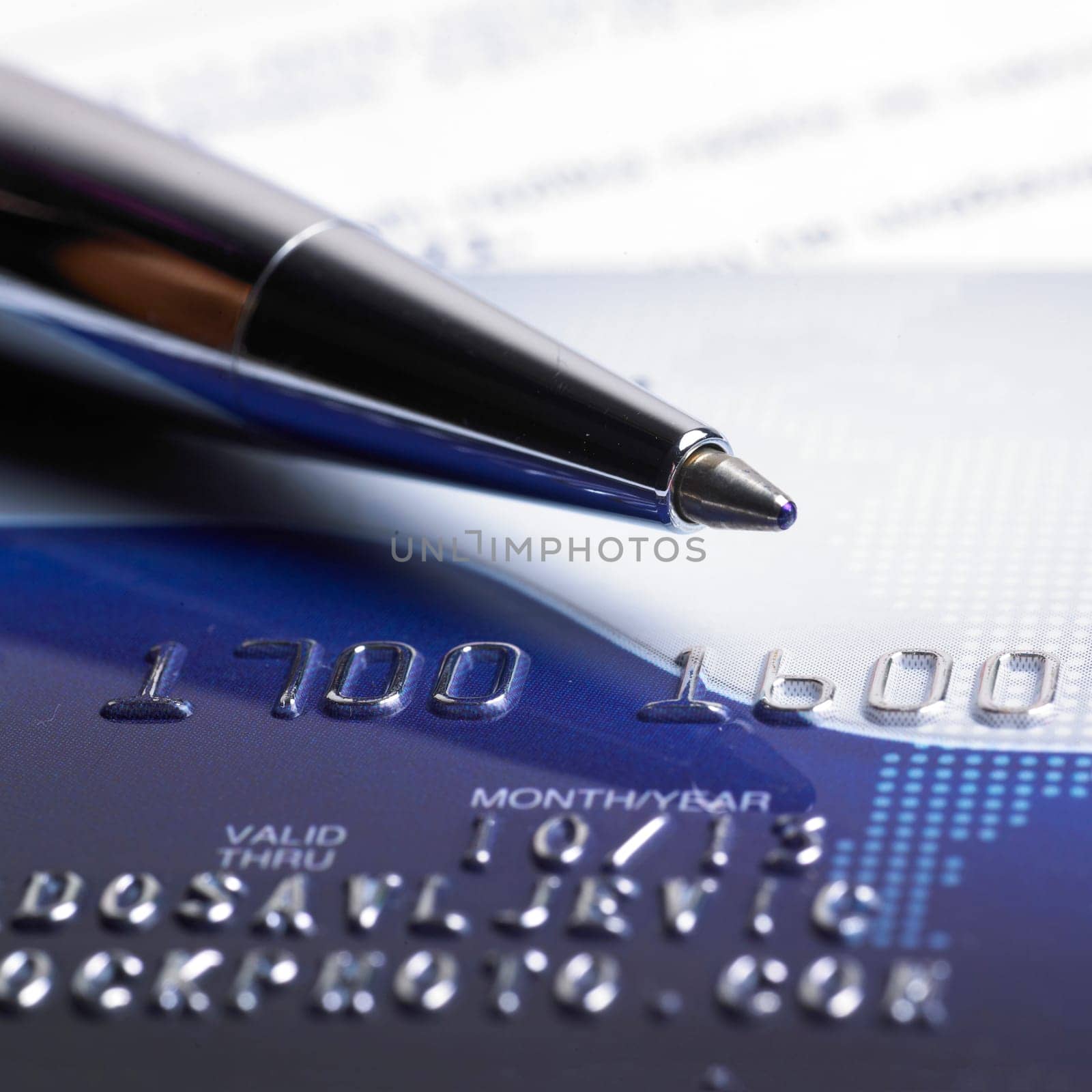 Close up a credit card and pen