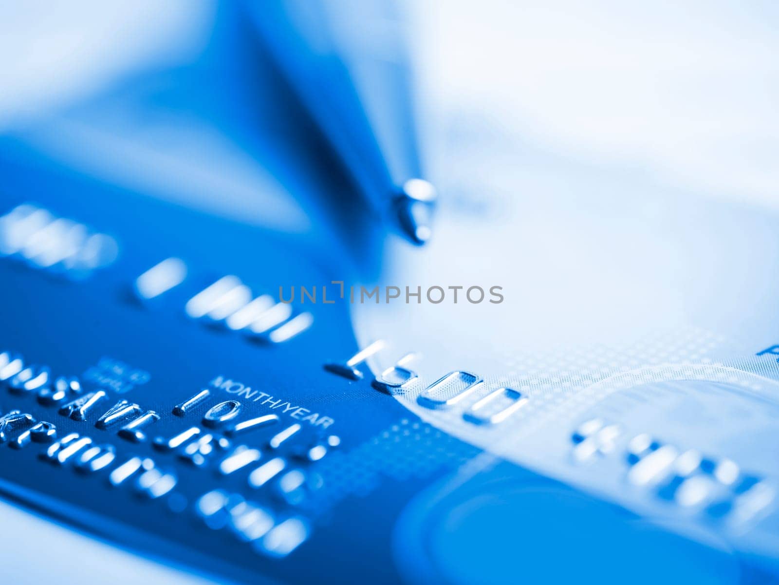Close up a credit card and pen