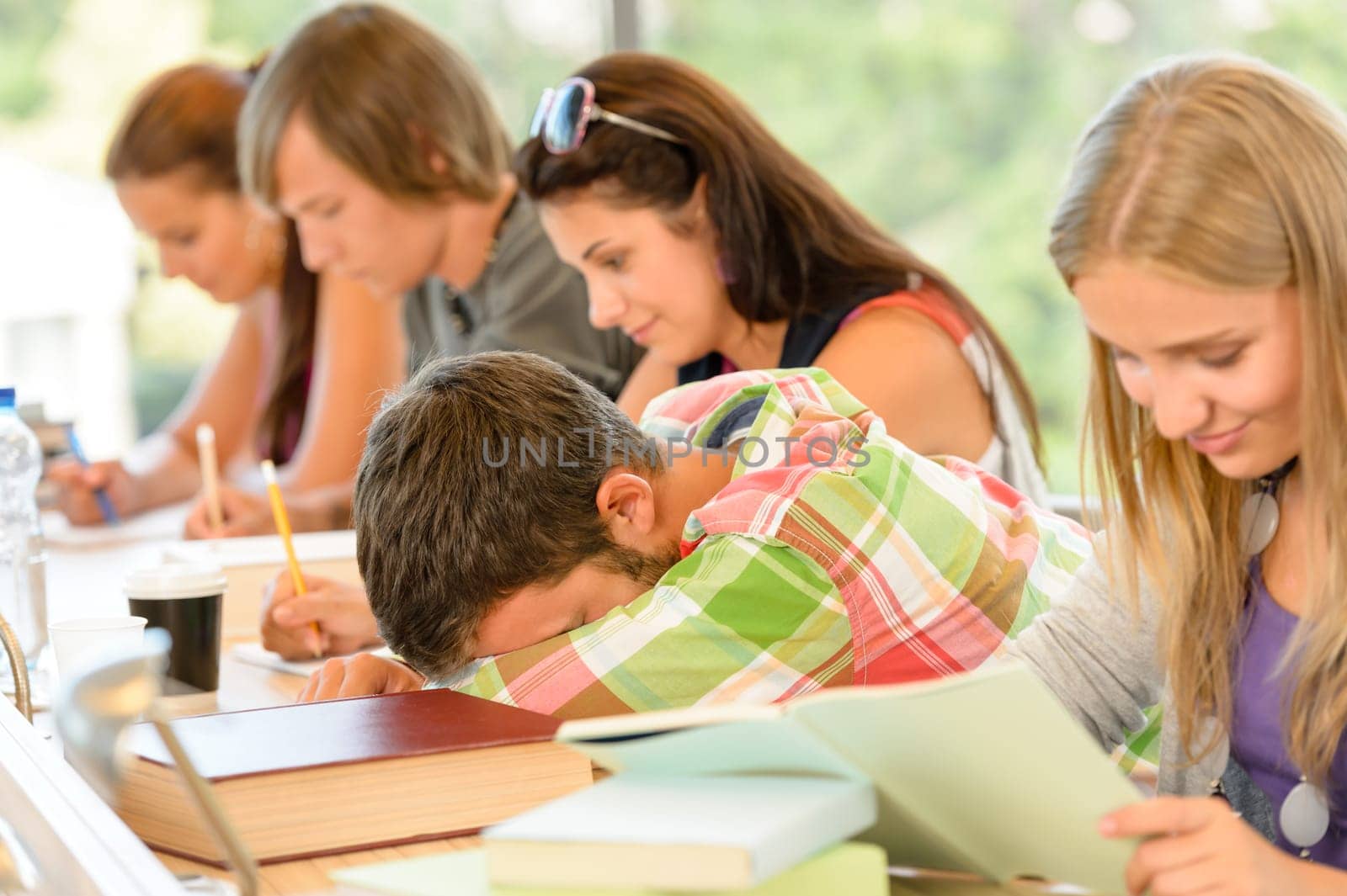 High-school student falling asleep in class teens lesson college bored