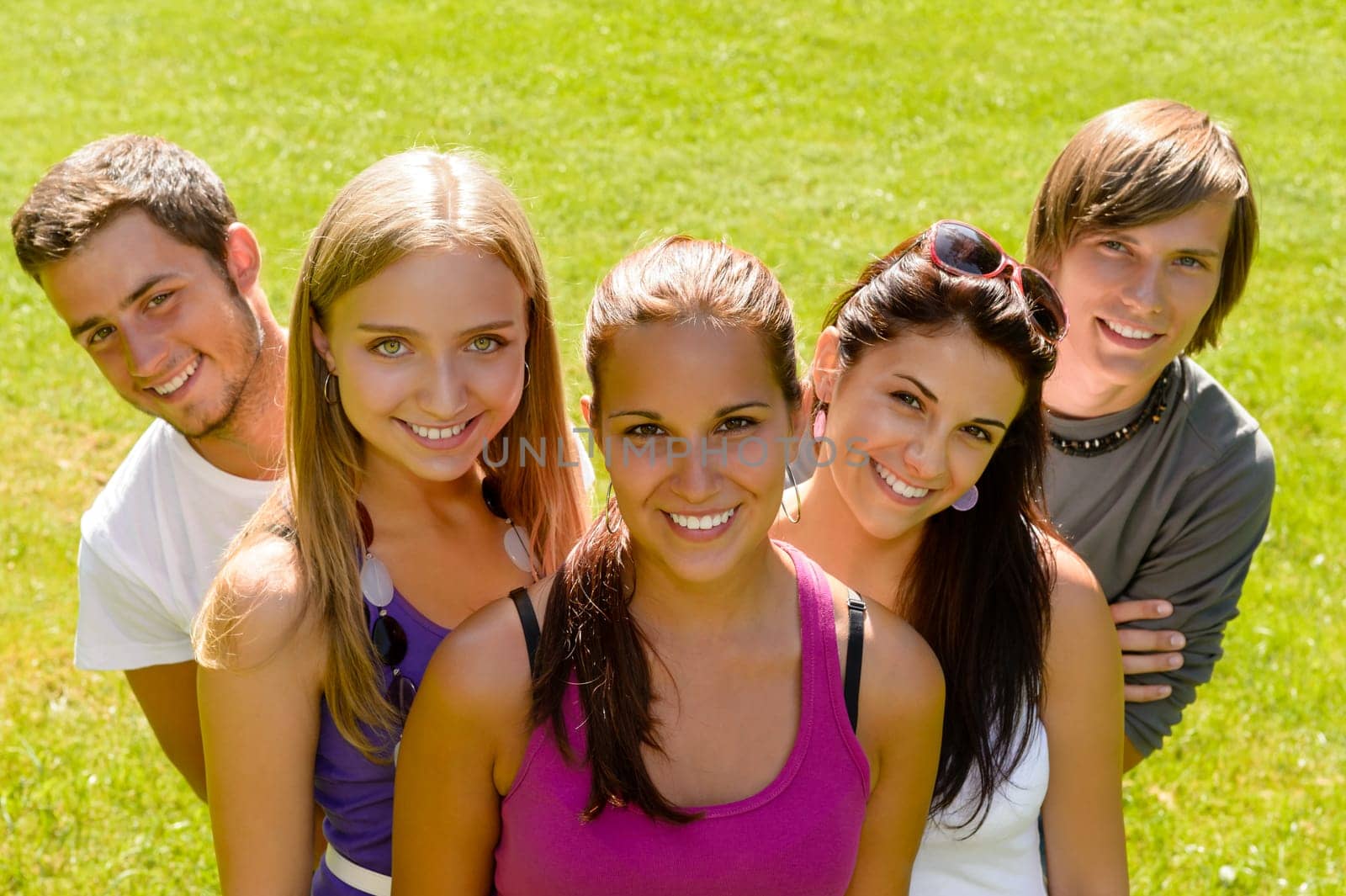 Teens relaxing in the park friends happy leisure young students