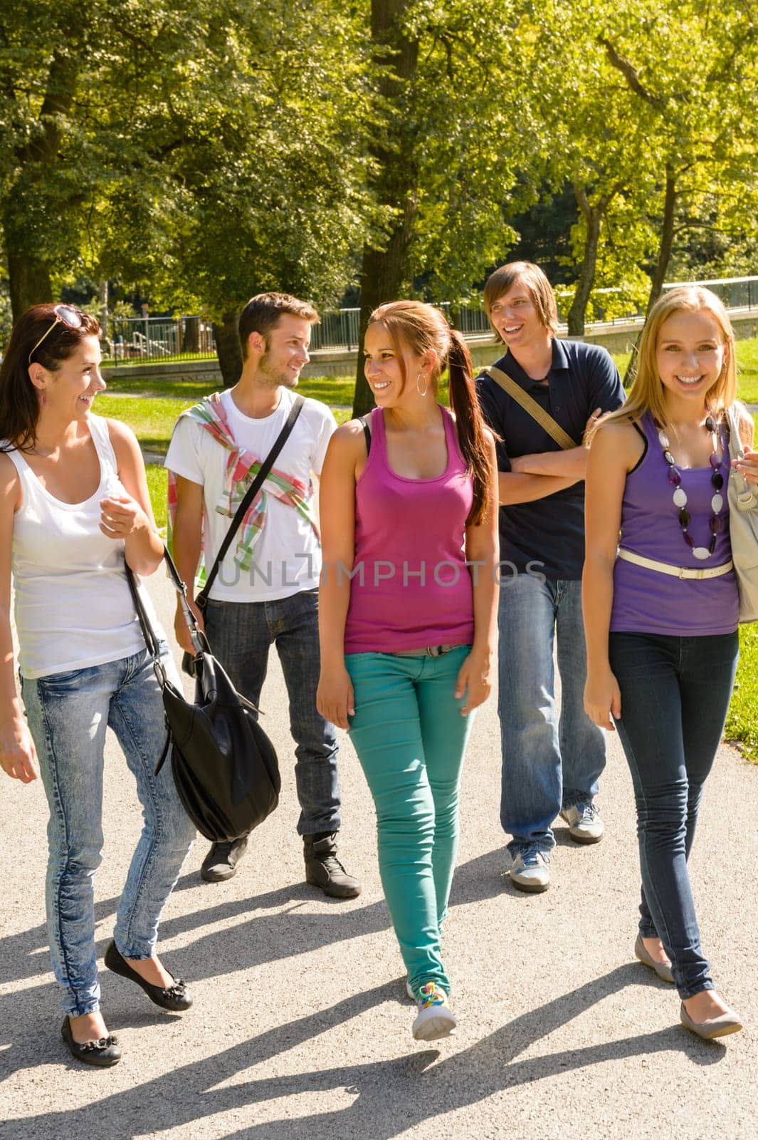 Students walking to school teens happy campus group youth friends