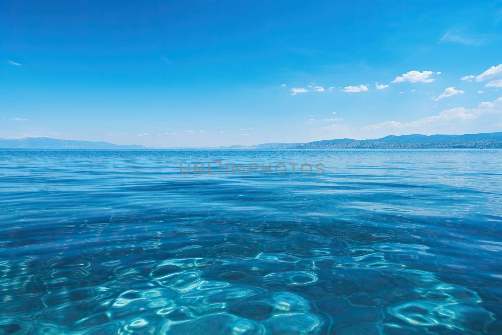 Side view of the transparent blue sea and sky. Beautiful seascape. Sea holiday and travel concept.