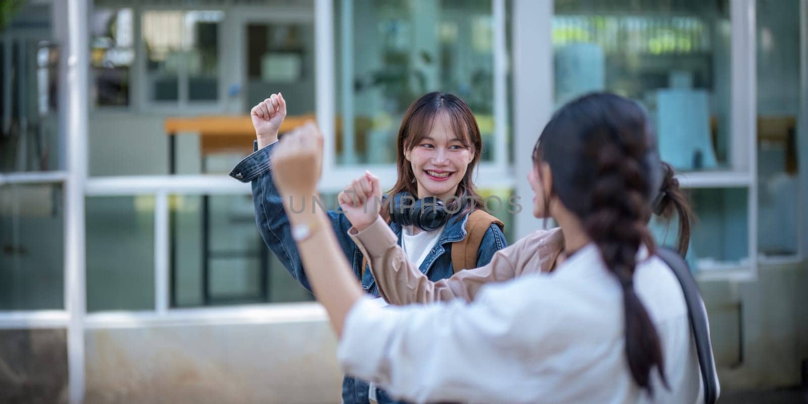 Student university friendship concept with classmate walking together at campus college park. Youth teenage and education.