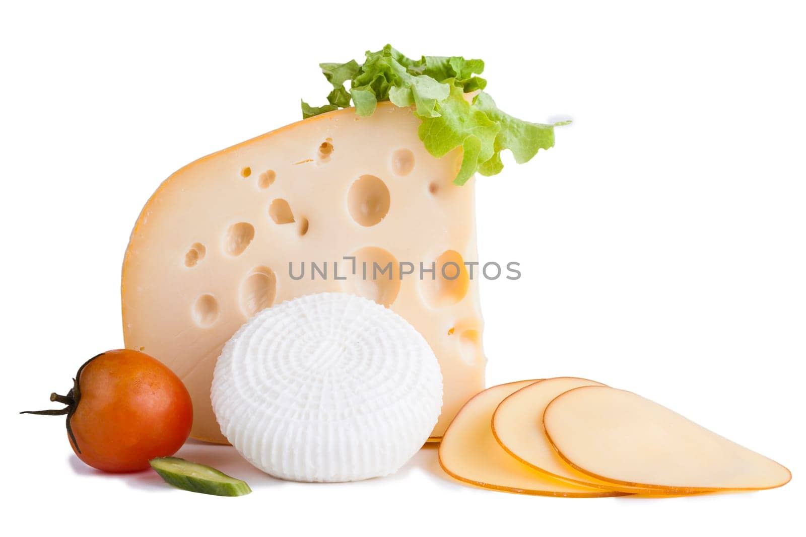 yellow cheese with a red tomato and some slices isolated on white background