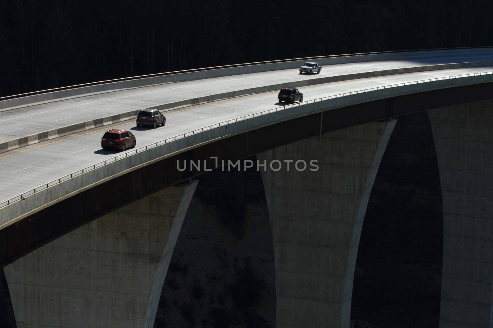 Cars crossing a high level bridge in British Columbia