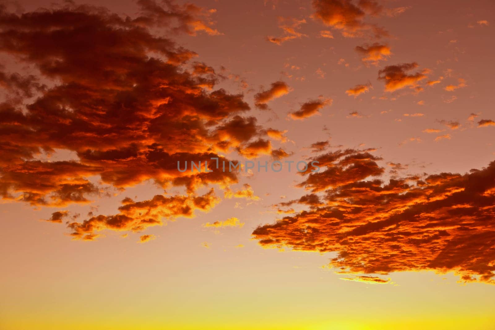 impressive sunset in the desert in Arizona with golden clouds