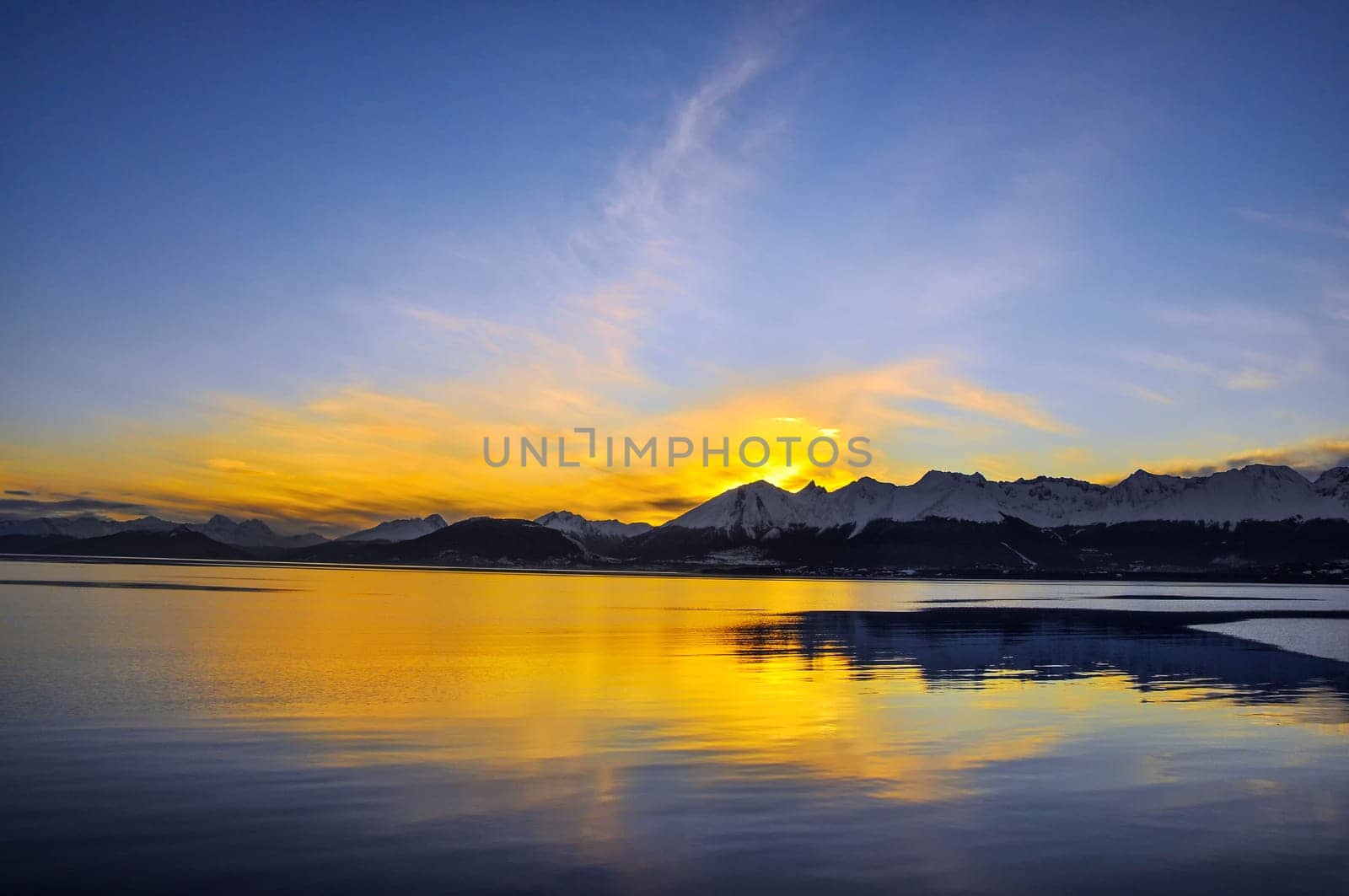 The sun going down behind the mountains near Ushuaia, Teirra del Fuego.