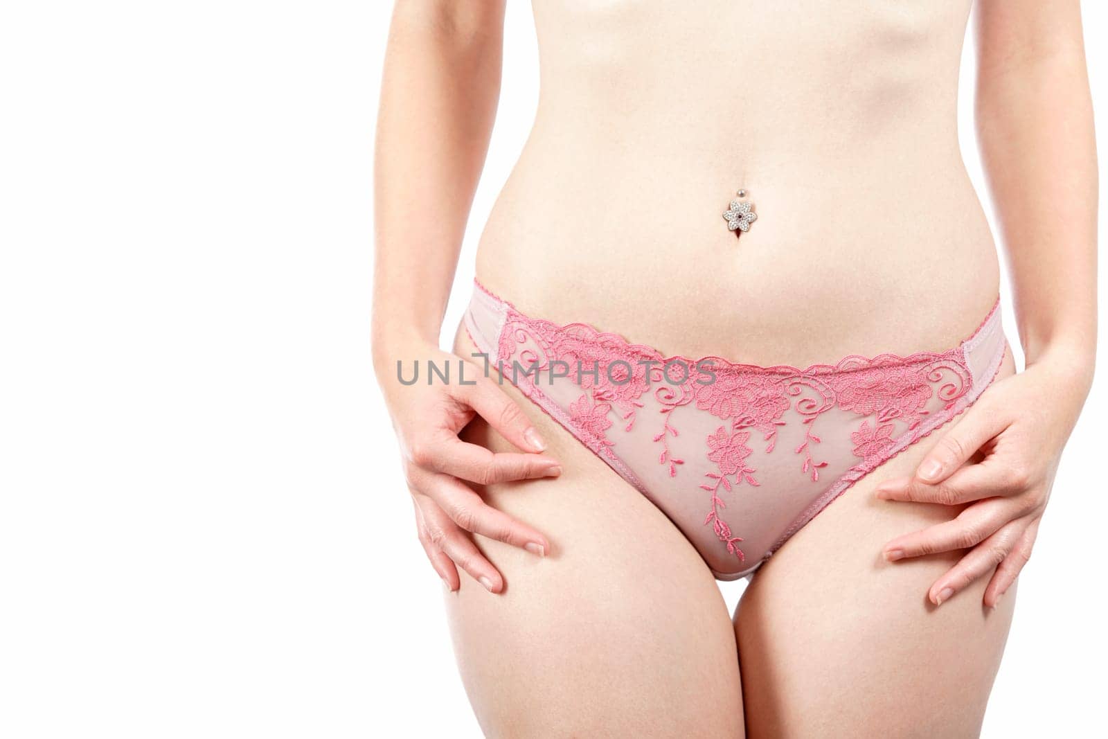 Attractive young woman's waist and stomach in underwear